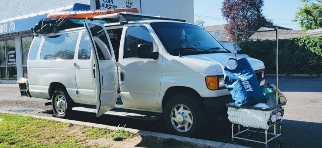 Outside broadcast van with satellite dish for live transmission