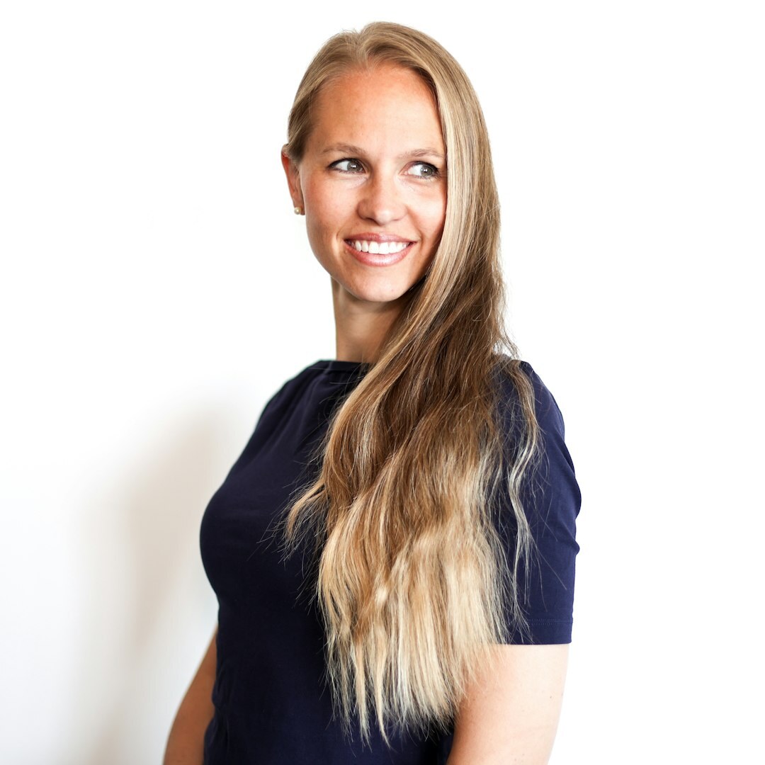 Finnish woman broadcast camera director smiling in studio